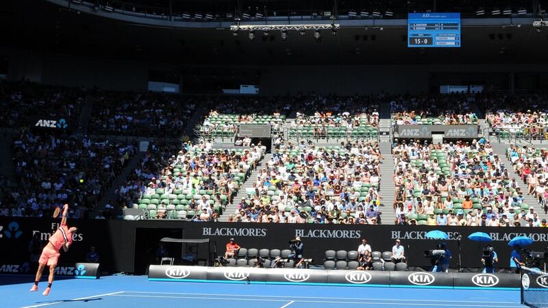 Dimitrov hits a serve in the quarter-final match. Photo: Allan Lee/Getty Images