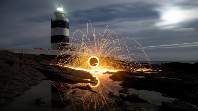Photography enthusiasts can enter a competition to  capture the best image of the  sunset and harvest moon rise at Hook Lighthouse   during National Culture Night. Last year’s winning photograph, taken by Dwane Doran.