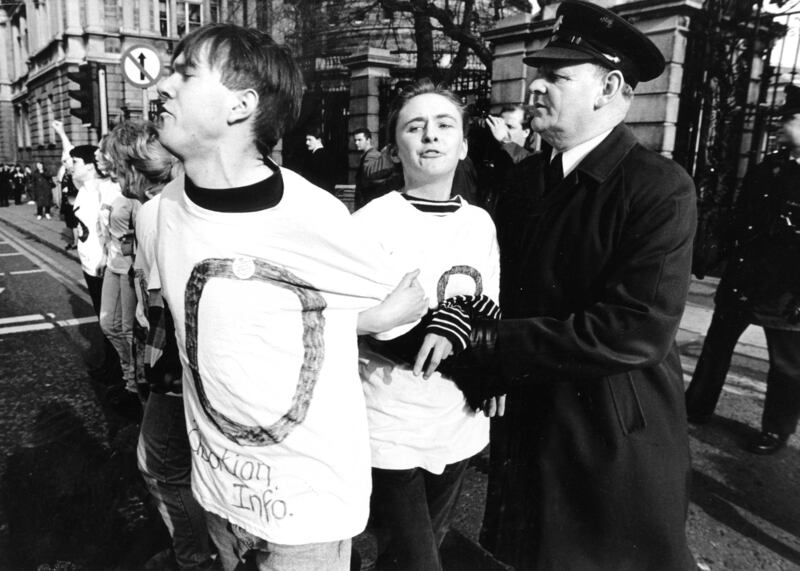 Gardaí removing student demonstrators from outside the gates of Leinster House during a 1992 protest over the X case. Photograph: Eric Luke
