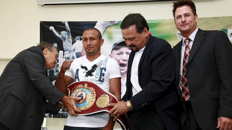 Sean Gibbons (right) with Francisco Varcarcel, Orlando Salido and Luis Perez at the presentation of Salido’s WBO featherweight belt in Mexico City in 2011. Photo: Manuel Velasquez/Jam Media/LatinContent/Getty Images
