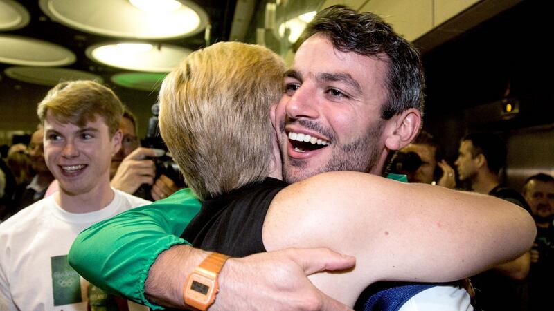 400m hurdler Thomas Barr is greeted at Dublin Airport. Photograph: INPHO/Tommy Dickson