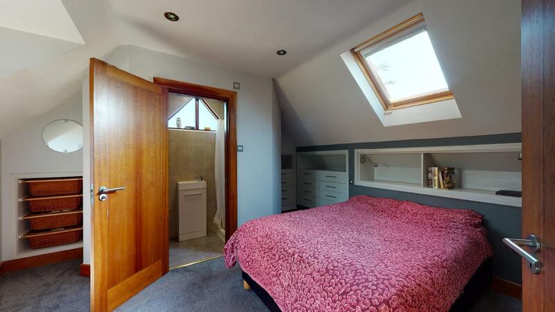 One of the two upstairs bedrooms