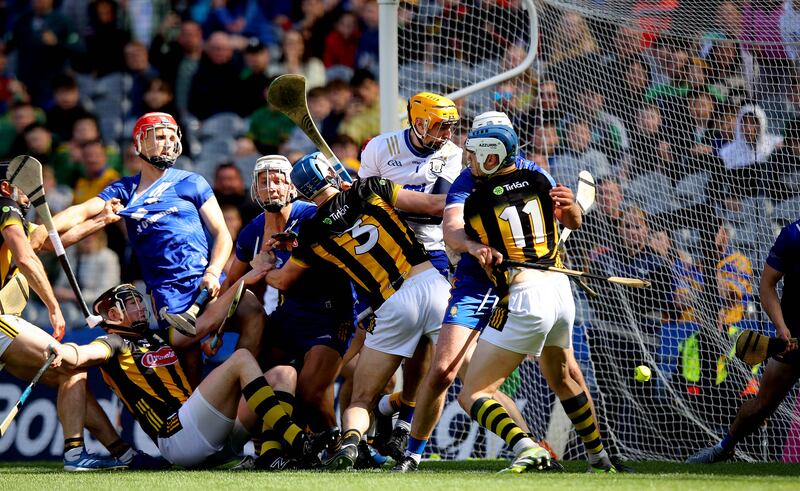 Clare defend a late Kilkenny free at Croke Park. Photograph: Ryan Byrne/Inpho