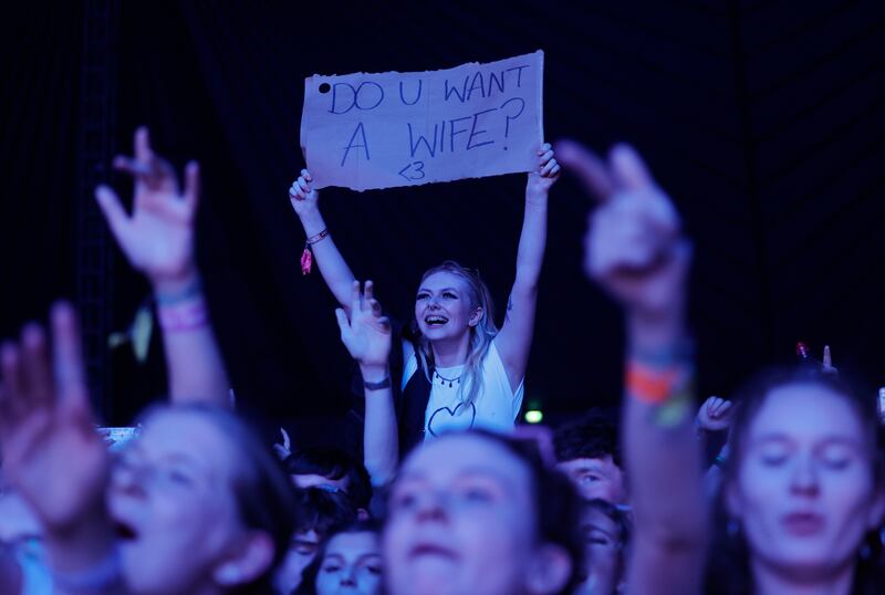 An offer from a fan as Elijah Hewson and Inhaler perforfm at Electric Picnic. Photograph: Alan Betson/The Irish Times

