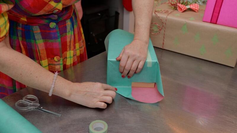 Step 4: It’s important to get sharp edges when you’re folding the paper over at the sides. Photograph: Alan Betson