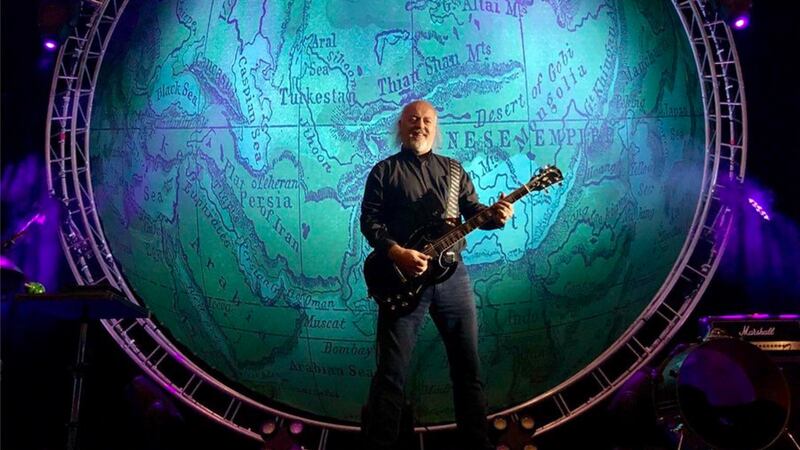 Bill Bailey on stage performing Larks in Transit