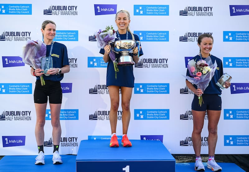 Women's race winner Nichola Sheridan, with second placed Noreen Brouder (left) and third placed Edel Gaffney. Photograph: Ramsey Cardy/Sportsfile