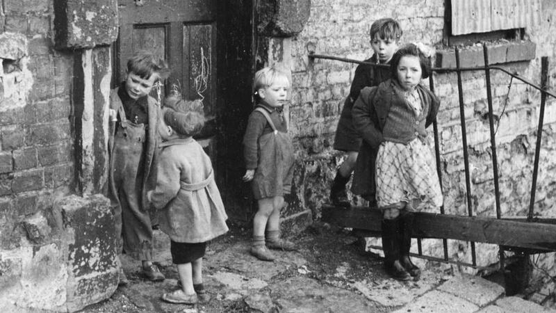 Children in the slums of Cumberland Street in the 1940s: Shaw as an economist understood better than most capitalists how an economy works but also believed an economy should not be producing luxuries until social necessities have been taken care of. Photograph: Paul Popper/Popperfoto/Getty