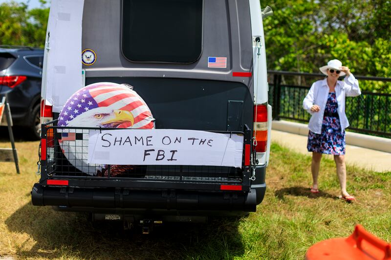 A Donald Trump supporter near his Mar-a-Lago residence in Palm Beach, Florida, on Tuesday. Photograph: Saul Martinez/New York Times