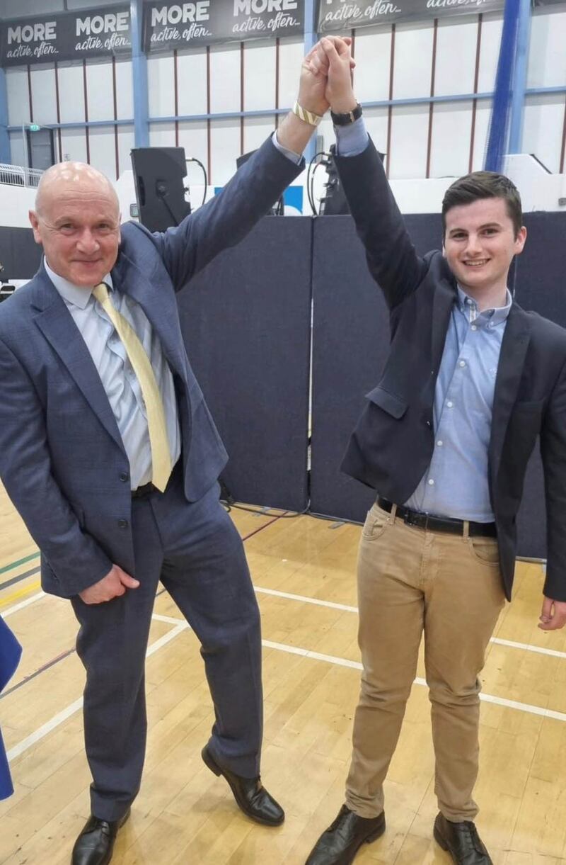 
Lewis Boyle (right) of the Alliance, with party colleague and MLA John Blair, at the Valley Leisure Centre in Newtownabbey, Co Antrim, after he became the youngest ever elected representative in Northern Ireland by getting elected to Antrim and Newtownabbey Council. Photograph: Lewis Boyle/PA Wire