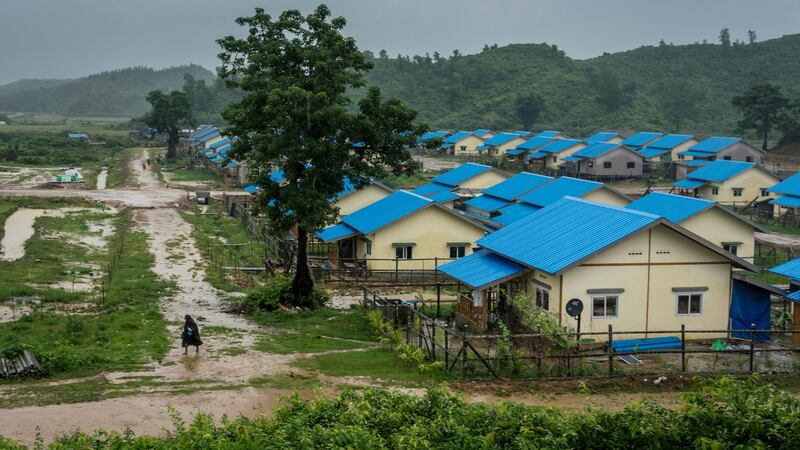 A villager walks past prefabricated huts that the Myanmar government said it had prepared for the returning Rohingya Muslims, in Maungdaw Township, Myanmar. Photograph: Adam Dean/The New York Times