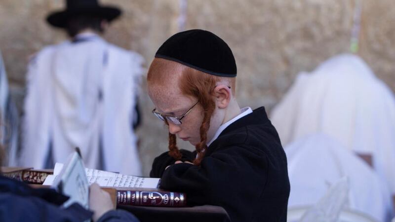 An ultra-Orthodox Jewish boy prays at the Western Wall, Judaism's holiest prayer site, during the Jewish holiday of Passover in Jerusalem's Old City last month. Photograph: Baz Ratner/Reuters