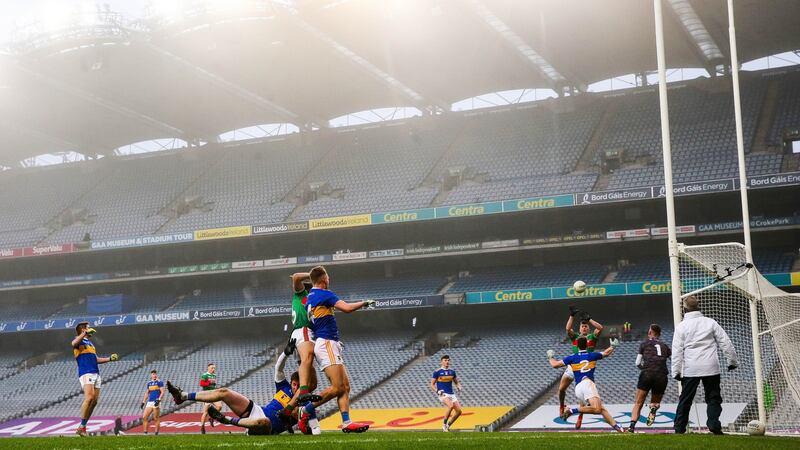 Cillian O’Connor punches home Mayo’s first goal. Photo: Ryan Byrne/Inpho
