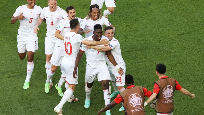 Embolo celebrates putting Switzerland ahead. Photo: Naomi Baker/EPA