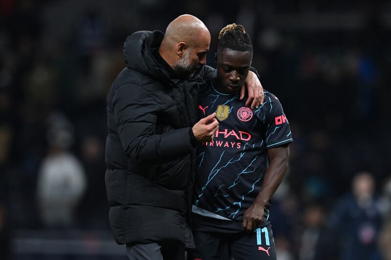 Pep Guardiola speaks with Manchester City's Belgian midfielder Jeremy Doku after the victory over Tottenham Hotspur. He considered Klopp his main rival. Photograph: Glyn Kirk/AFP 
