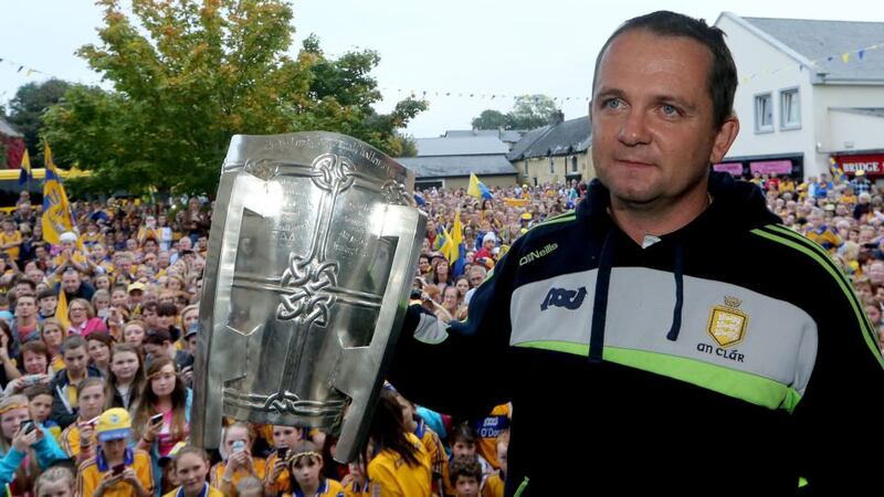 Clare manager Davy Fitzgerald with the Liam MacCarthy cup  at his home town of Sixmilebridge. Photograph: James Crombie/Inpho