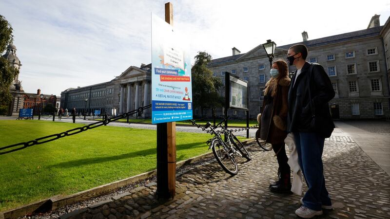 Savannah Turnbull and Anna Eustace, first-year  students,  at Trinity’s  main square. Photograph: Alan Betson