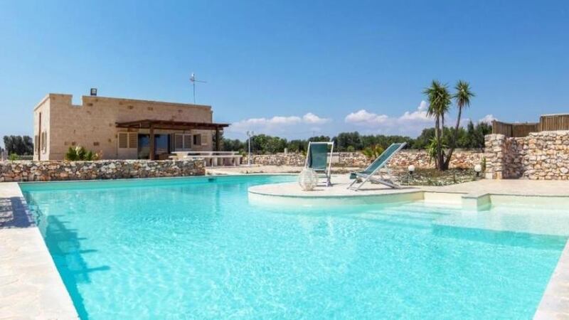 Italy: this villa in Apulia sits on its own land, which includes an olive grove and a swimming pool