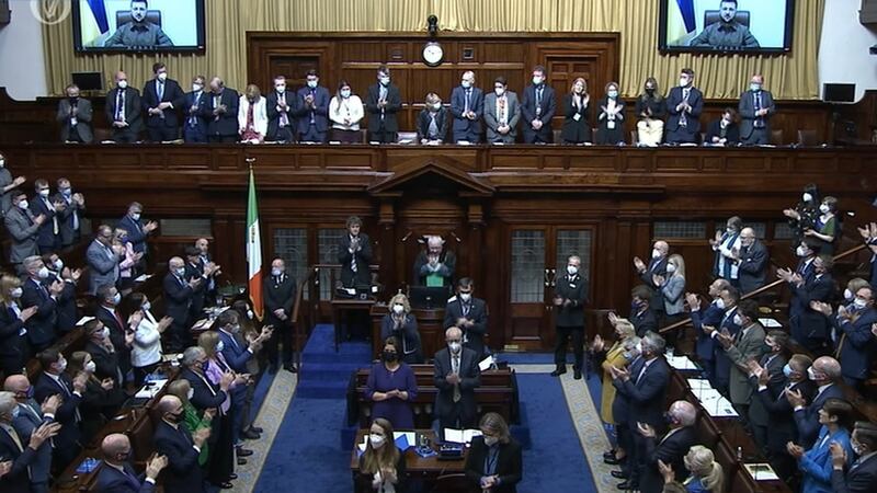TDs, Senators and foreign diplomats stand to applause Volodymyr Zelenskiy in the Dáil chamber. Photograph: Oireachtas TV/PA