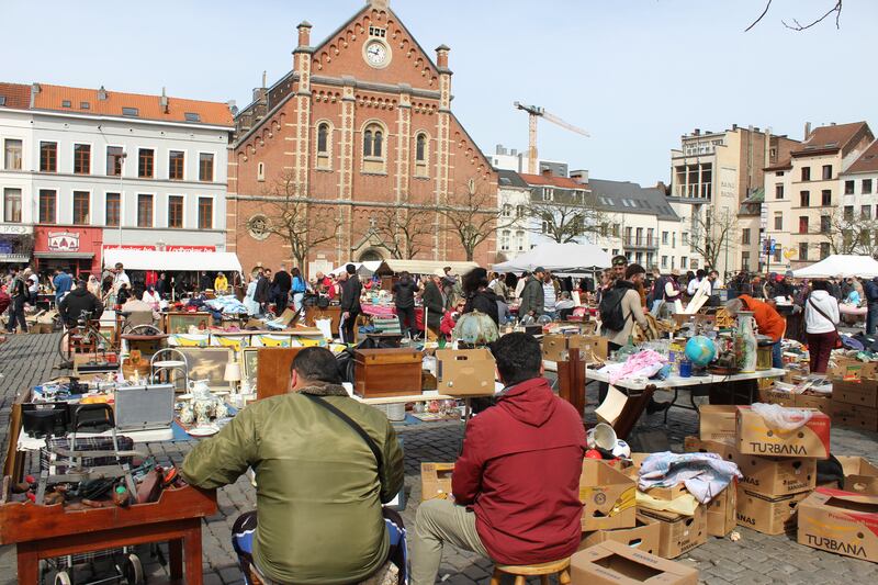 Traders selling second-hand wares at Place du Jeu de Balle flea market in Brussels: Photograph: Jack Power