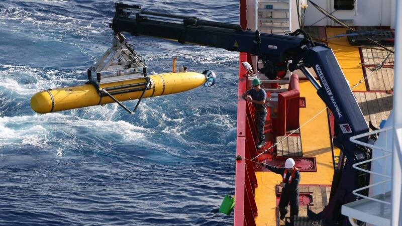 The Bluefin-21 Autonomous Underwater Vehicle is lifted over the side of the Australian Defence Vessel Ocean Shield in the southern Indian Ocean. Photograph: Australian Defence Force/Handout via Reuters