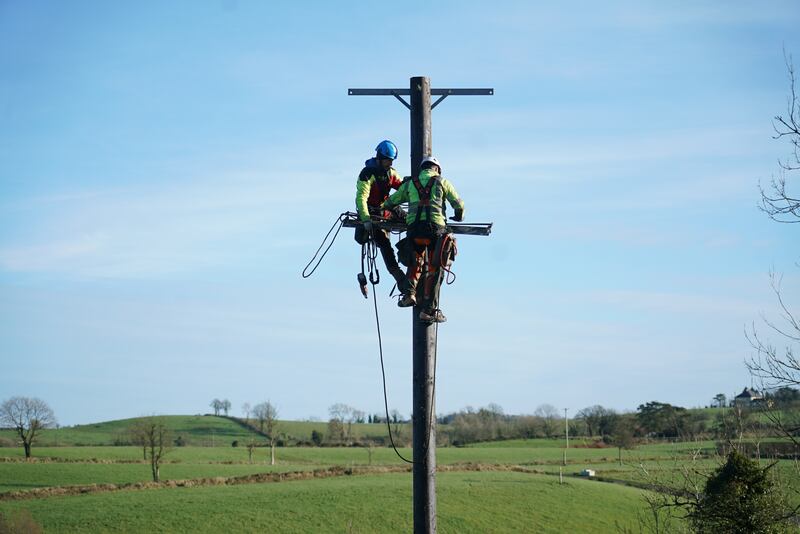 Austrian technicians work to reconnect ESB lines in Carcagh, Co Cavan. Photograph: Enda O'Dowd/The Irish Times