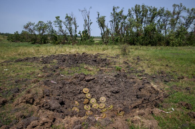 Mines in a crater outside the village of Makarivka, in the Zaporizhzhia region of southern Ukraine. As Ukraine continues its counteroffensive, Russian defences remain formidable. Photograph: Tyler Hicks/New York Times 