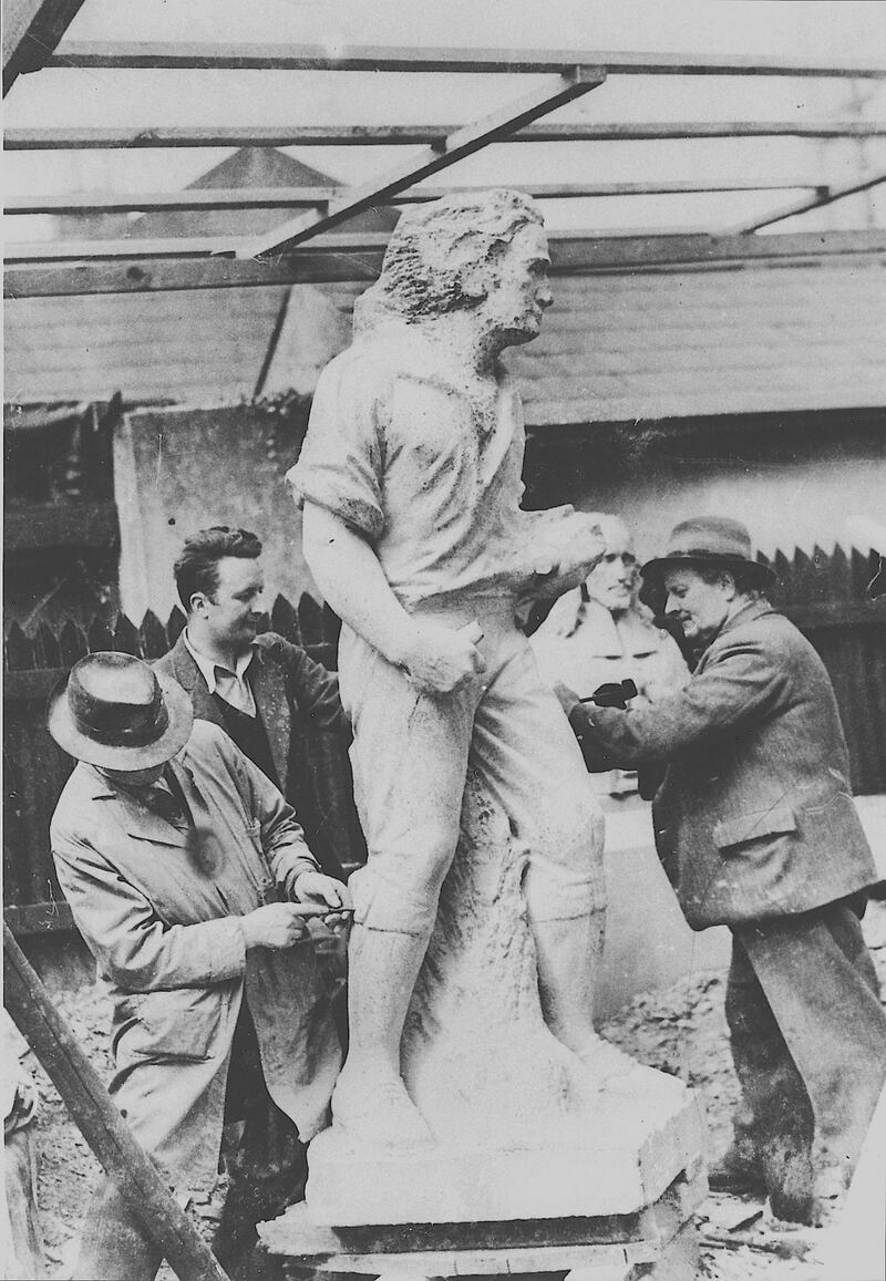 Albert Power at work with a team of assistants