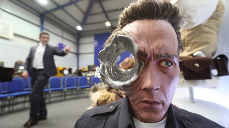 A Terminator   replica bust stands among items seized from a drug lord  which are to be auctioned at Wilsons Auctions in Mallusk, Co Antrim. Photograph: Niall Carson/PA Wire