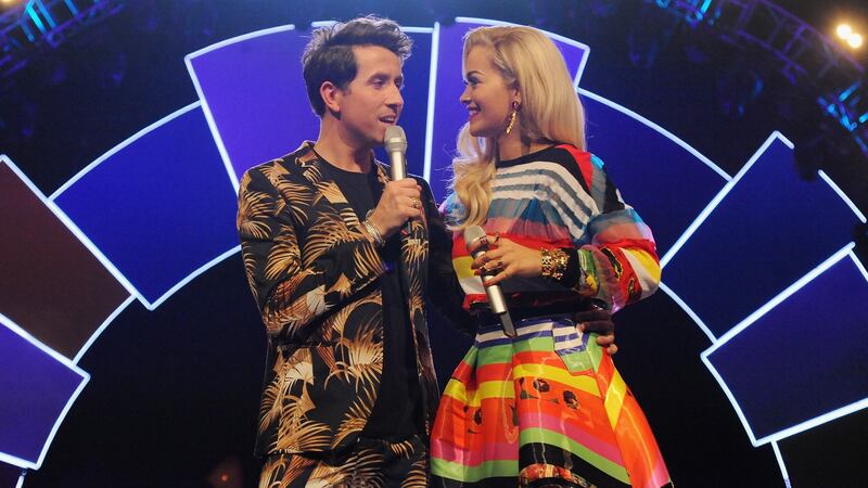 Nick Grimshaw and Rita Ora attend the Radio One Teen Awards in 2014. File Photo by Eamonn M. McCormack/Getty Images