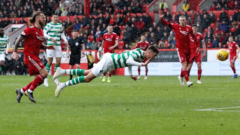 Mikael Lustig scores Celtic’s opener against Aberdeen. Photograph: Ian MacNicol/Getty