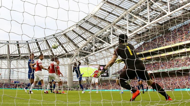Chelsea’s Antonio Rudiger scores a header past Arsenal goalkeeper Peter Cech of Arsenal during the International Champions Cup game at the  Aviva Stadium in  Dublin. Photograph: Tommy Dickson/Inpho