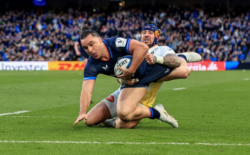 Leinster’s James Lowe on his way to scoring a try despite Jack Nowell of Stade Rochelais. Photograph: Dan Sheridan/Inpho