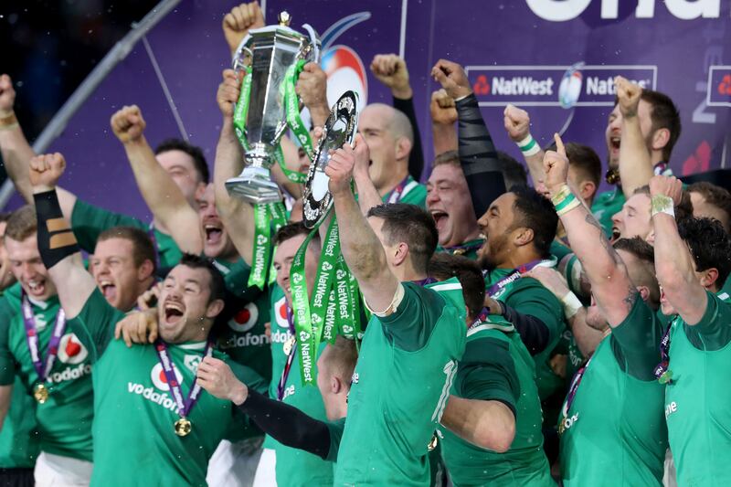 The Ireland team celebrate winning the grand slam in 2018 Photograph: Bryan Keane/Inpho