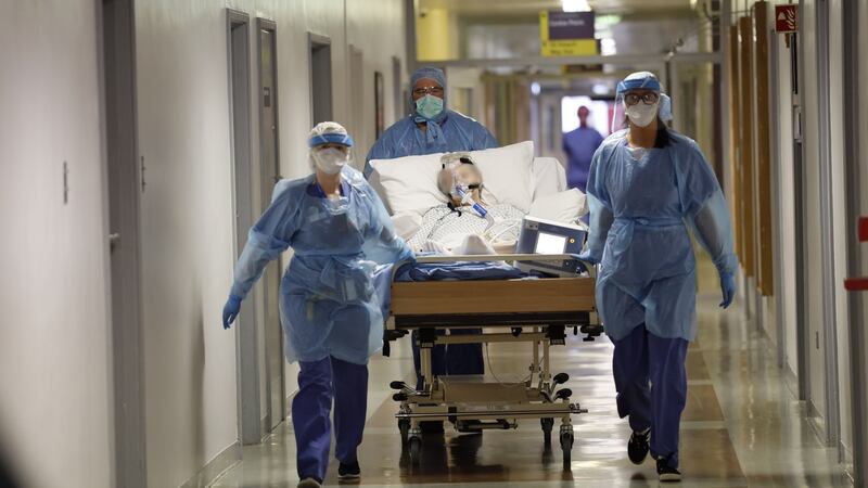 A coronavirus patient being transferred at St Vincent’s hospital. Photograph: Alan Betson