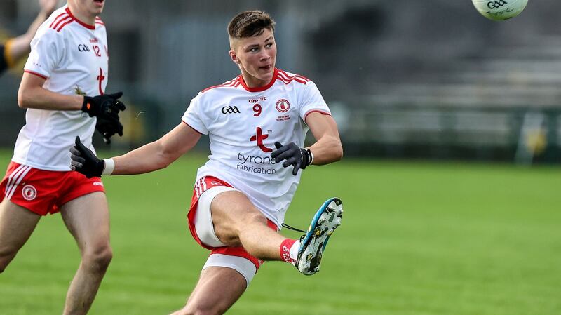 Tyrone’s Ruairí McHugh scores a point during the Electric Ireland Ulster minor football final against Donegal at Brewster Park. Photograph: John McVitty/Inpho