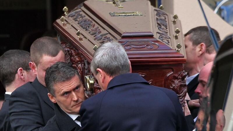 Mourners, including convicted  INLA killer  Dessie O’Hare (front left), carry the   remains of Eamon Kelly  after his funeral mass at St Brigi d’s Church, Killester in December 2012. Photograph: Colin Keegan/Collins, Dublin.