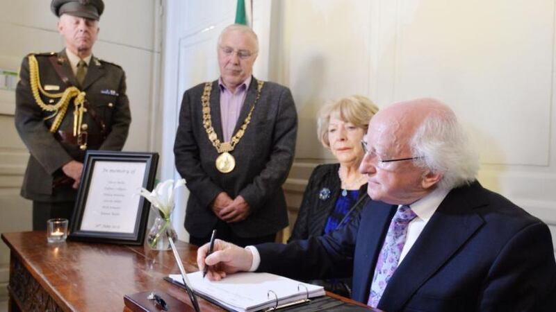 President Michael D Higgins signs a Book of Condolence at the Mansion House in Dublin on Thursday for the victims of the Berkeley balcony tragedy. Photograph: Alan Betson/The Irish Times