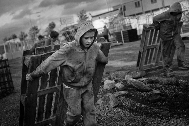 'Calvary'. A local boy drags a pallet to the annual Halloween bonfire. Photograph: Paul Kelly