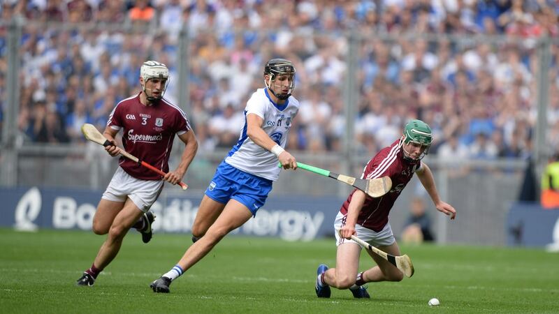 Daithí Burke, left, has become a formidable presence at full back for Galway. Photograph: Dara Mac Dónaill