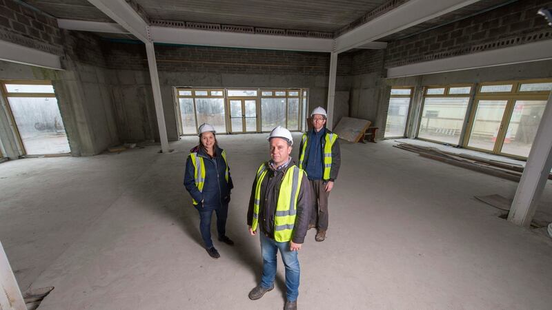 Kathryn O’Flaherty, hospitality director, Leon Rossiter, project manager, and Colin Hamilton, clerk of works, inside the  Dzogchen Beara Tibetan Buddhist Retreat Centre in Co Cork. Photograph: Michael Mac Sweeney/Provision