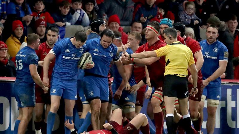 Tempers flare between Leinster’s Jonathan Sexton and Munster’s Joey Carbery during the Pro14 encounter at Thomond Park. Photo: Dan Sheridan/Inpho