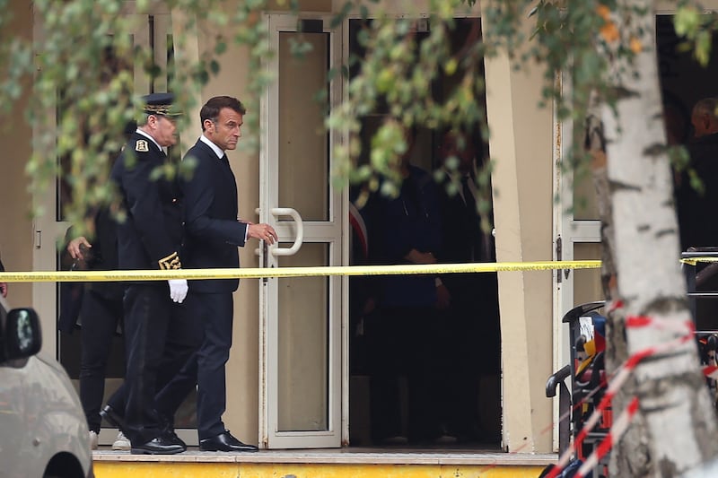 French president Emmanuel Macron (centre) arrives at the Gambetta high school in Arras after the attack on October 13th. Photgraph: Francois Lo Presti/AFP via Getty