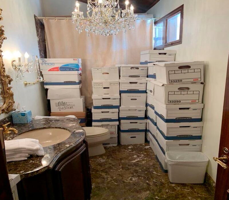 A photo provided by the US justice department, and included in the unsealed indictment of former President Donald Trump, shows document boxes in a bathroom and shower in the Lake Room at Mar-a-Lago. Photograph: New York Times