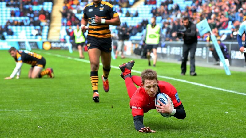 Liam Williams dives to score for Saracens against Wasps. Photograph: Alex Livesey/Getty