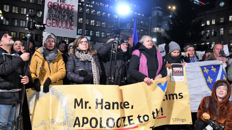 People stage a protest against  Peter Handke, who denies the genocide in Bosnia, in Stockholm, Sweden. Photograph: Anadolu Agency via Getty
