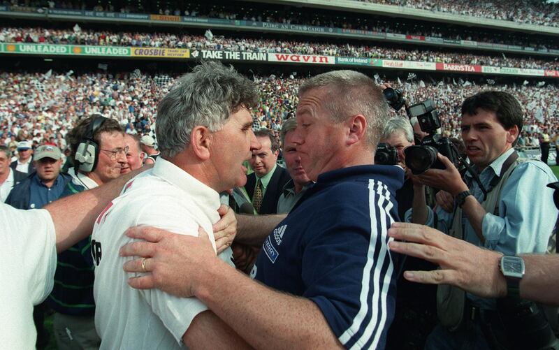 Kildare manager Mick O'Dwyer and Kerry manager Páidí Ó Sé following the 1998 All-Ireland football semi-final. Photograph: Billy Stickland/Inpho