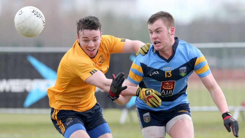GAA Sigerson Cup Final: DCU’s Conor Moynagh and UCD’s Eoin Lowry. Photograph: Inpho/Presseye/Declan Roughan