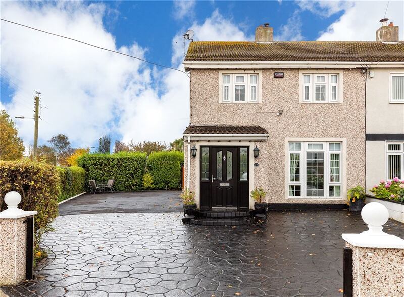 24 Grange Park Drive, Raheny: this three-bed end-of terrace is for sale for €550,000 with full planning permission for a three-bed, two-storey house in the extrawide space to its side
