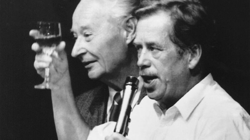 Vaclav Havel, leader of the Prague opposition (right), and Alexander Dubcek, leader of the ill-fated Prague Spring, toast as they celebrate the resignation of the Czech politbureau, in November 1989. File photograph: Dusan Vranic/AP Photo